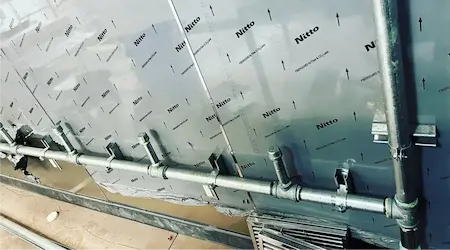 Licensed plumber working on Miami commercial project